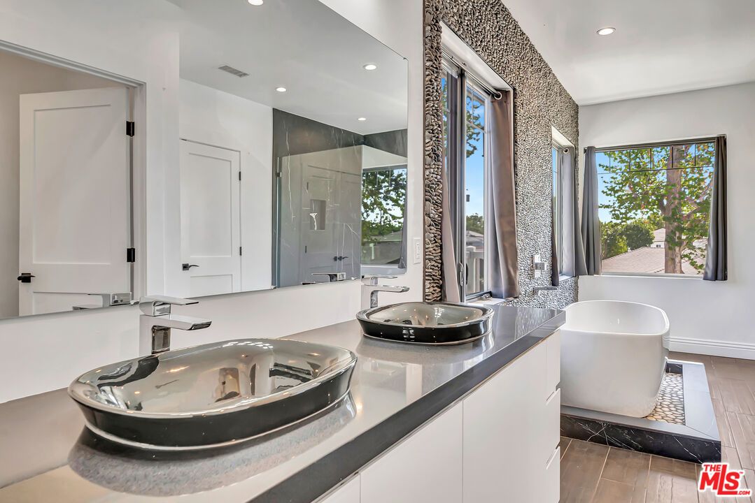 Bathroom, Dual Sink Vanities, Free Standing Baths, Interior, Recessed Lighting, Wood Texture Flooring