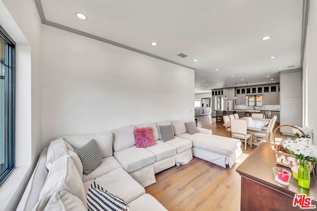 Dining room, Interior, Kitchen, Living room, Pendant Lights, Recessed Lighting, Stainless Steel Appliances, Wood Texture Flooring