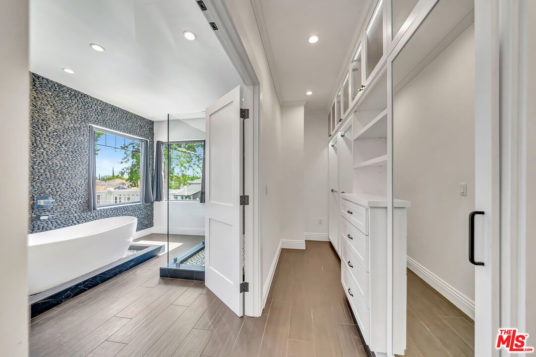 Bathroom, Free Standing Baths, Glass Shower, Interior, Recessed Lighting, Walk-in Closets, Wood Texture Flooring
