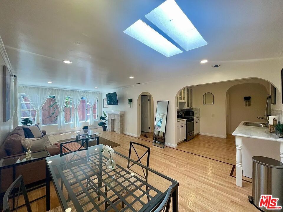 Fireplace, Interior, Kitchen, Living room, Recessed Lighting, Wood Texture Flooring