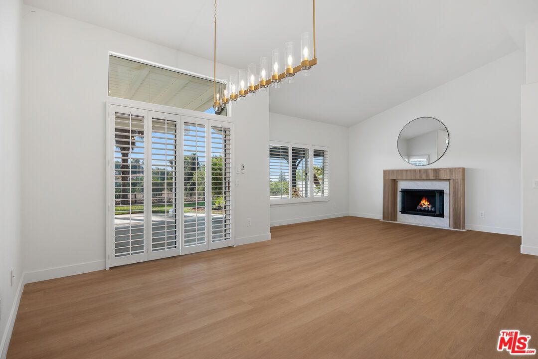 Empty room, Fireplace, Interior, Pendant Lights, Wood Texture Flooring