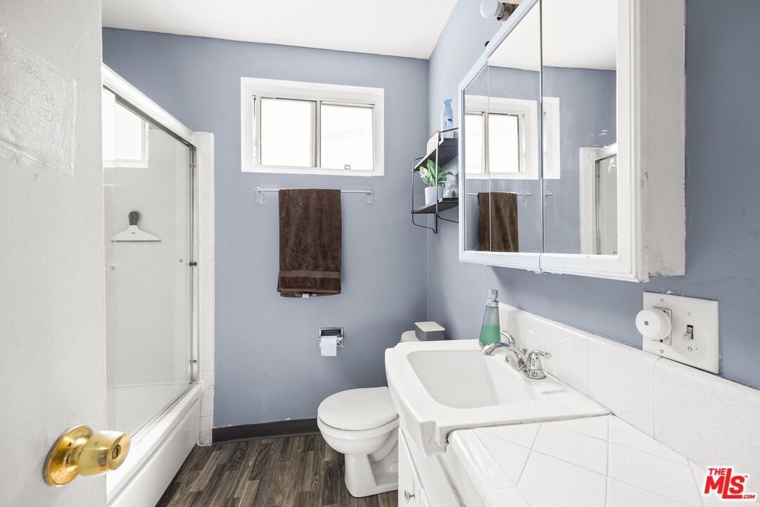 Bathroom, Glass Shower, Interior, Tile Countertops, Wood Texture Flooring