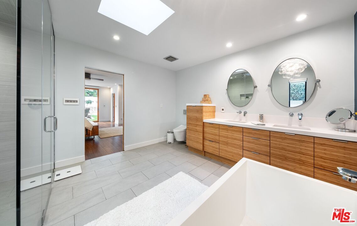 Bathroom, Dual Sink Vanities, Glass Shower, Interior, Recessed Lighting, Wood Texture Flooring