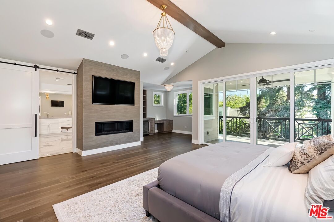 Bedroom, Chandelier, Fireplace, Interior, Recessed Lighting, Wooden Beams, Wood Texture Flooring