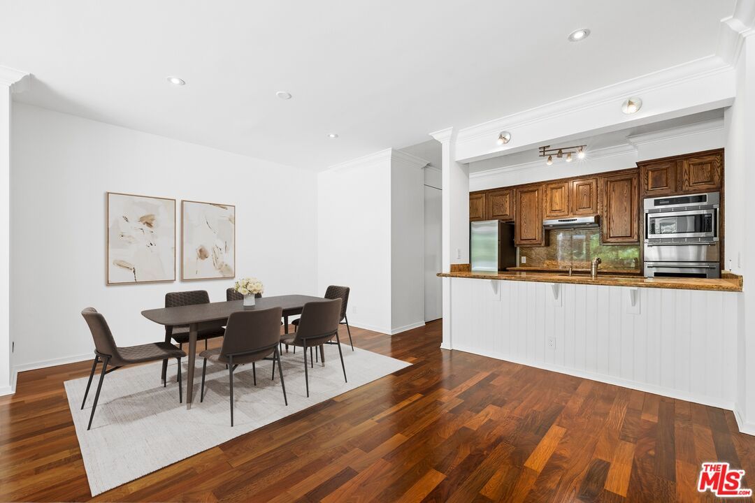 Dining room, Interior, Kitchen, Recessed Lighting, Stainless Steel Appliances, Wood Texture Flooring