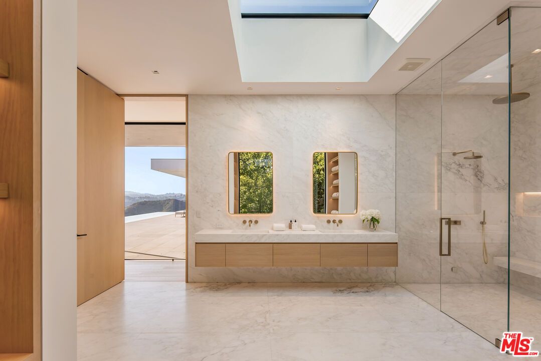 Bathroom, Dual Sink Vanities, Glass Ceilings, Glass Shower, Interior, Marble, Marble Walls, Recessed Lighting