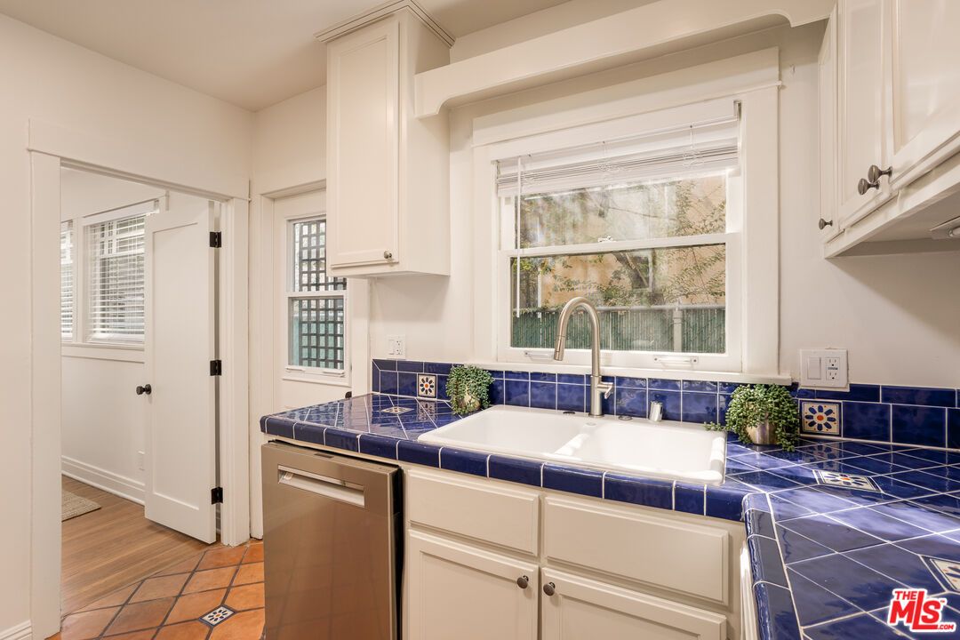 Interior, Kitchen, Tile Countertops, Wood Texture Flooring