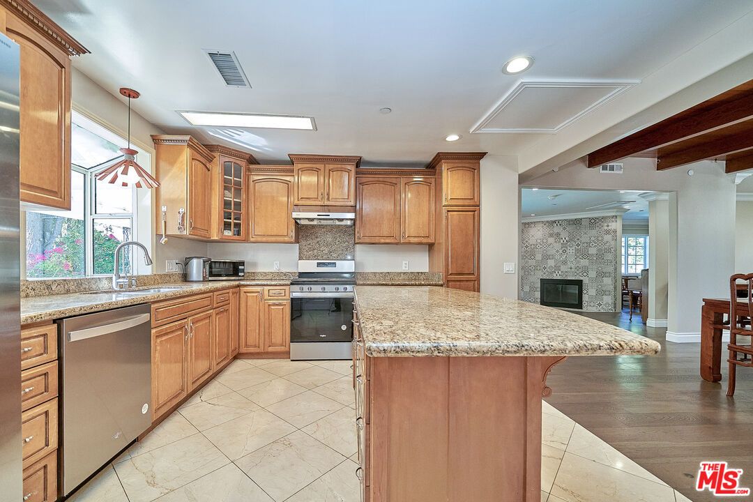 Fireplace, Interior, Kitchen, Pendant Lights, Recessed Lighting, Stainless Steel Appliances