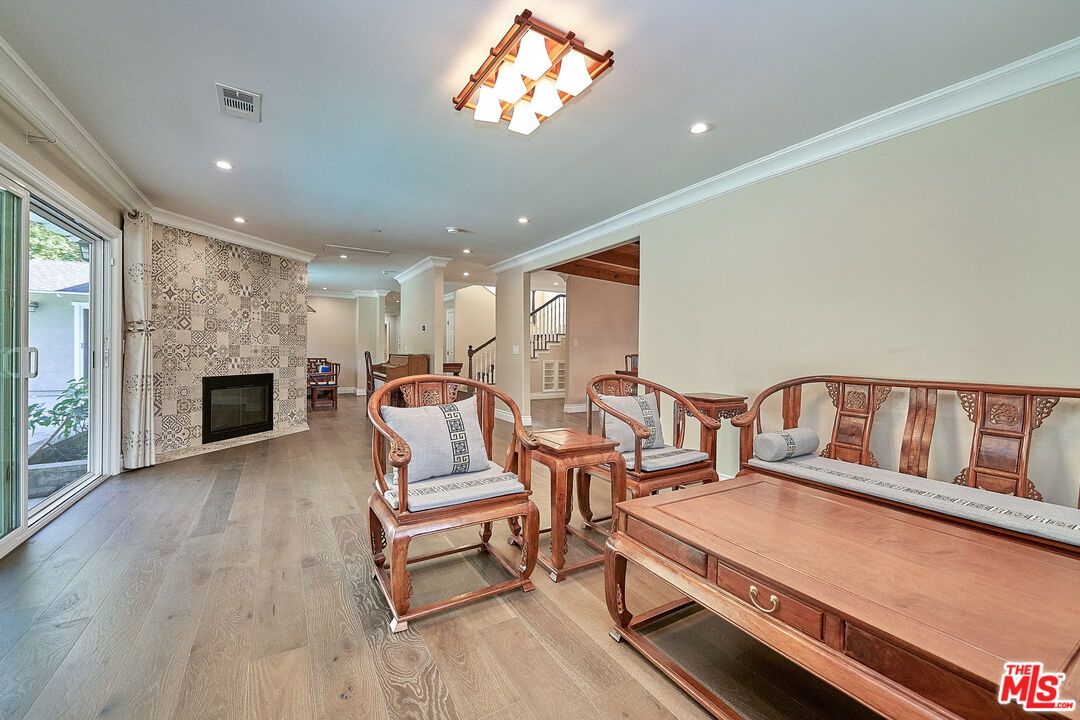 Fireplace, Interior, Recessed Lighting, Stone Walls, Wood Texture Flooring