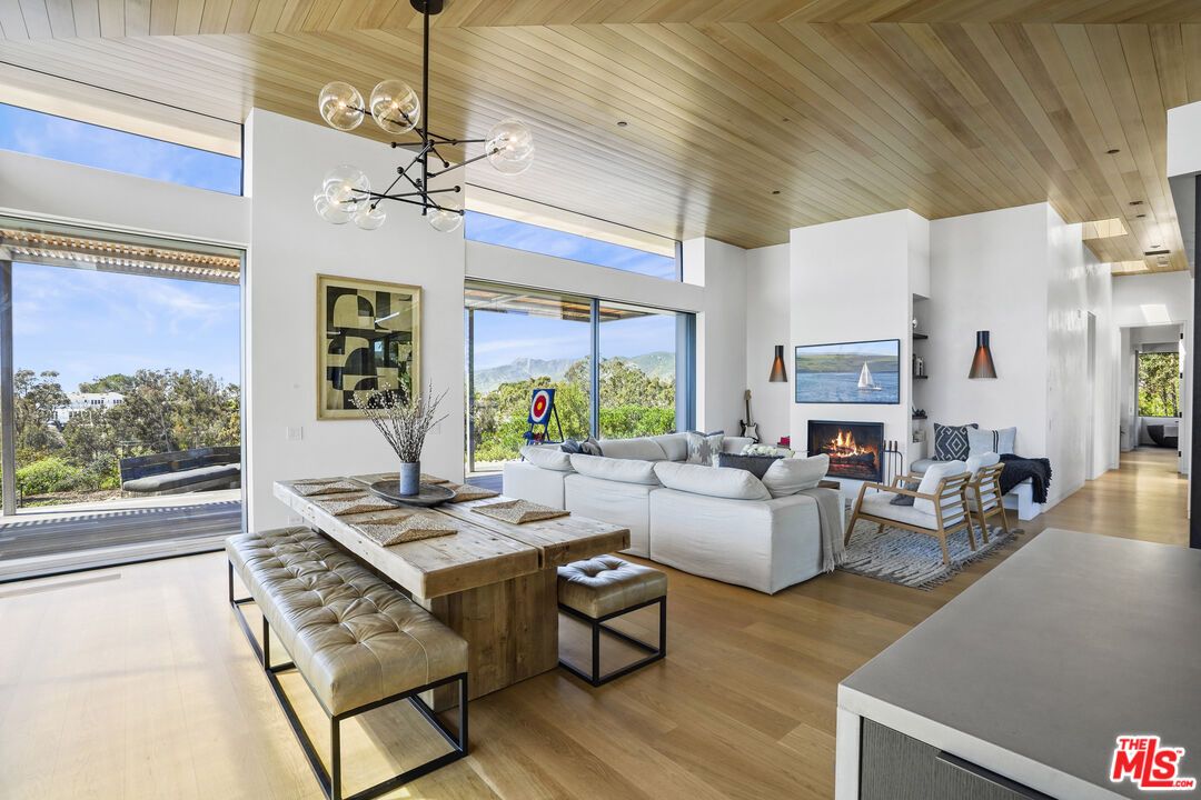 Fireplace, Interior, Living room, Pendant Lights, Recessed Lighting, Wooden Ceilings, Wood Texture Flooring