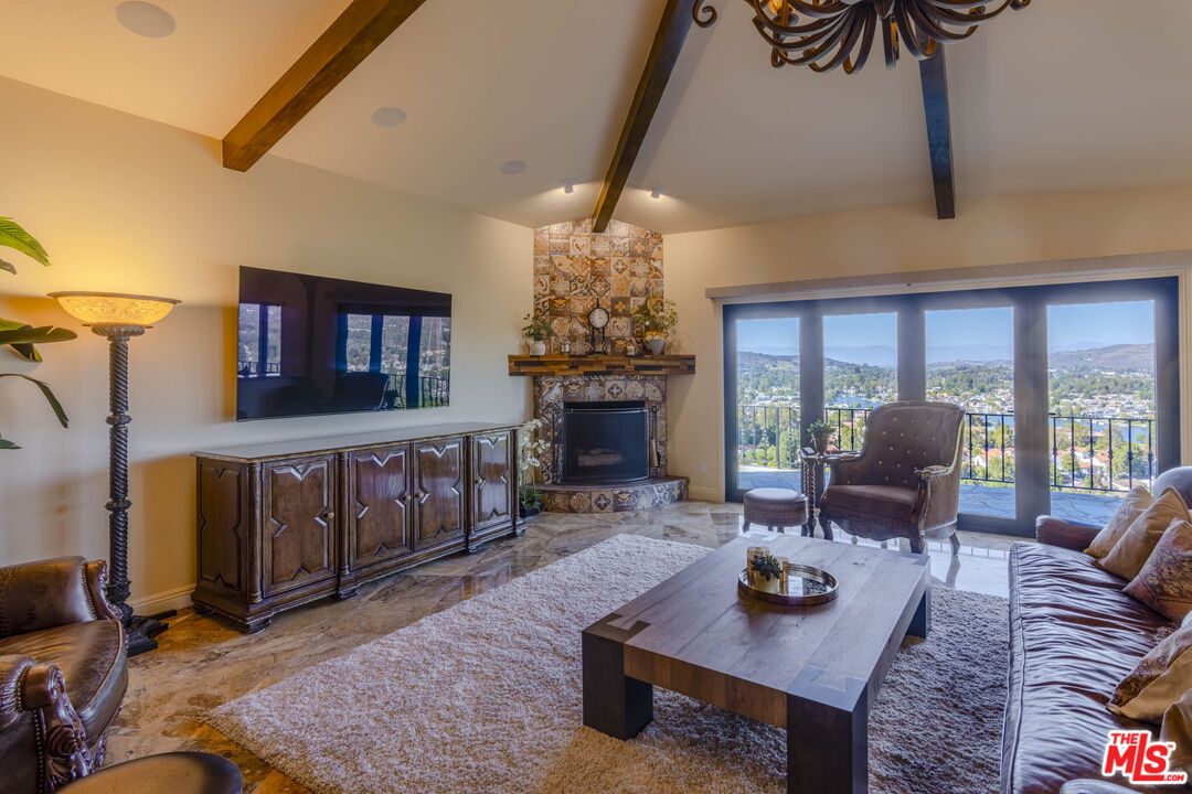 Fireplace, Interior, Living room, Recessed Lighting, Stone Walls, Wooden Beams, Wood Texture Flooring