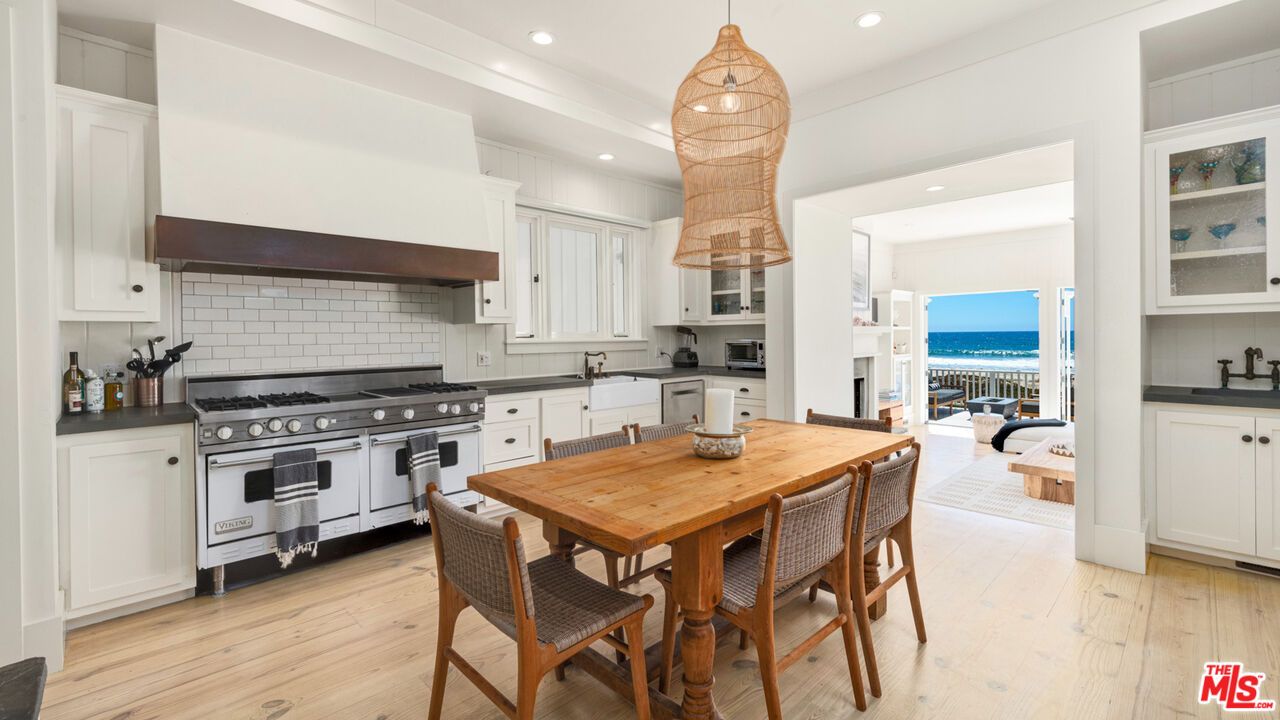 Dining room, Interior, Kitchen, Pendant Lights, Recessed Lighting, Stainless Steel Appliances, Water, Wood Texture Flooring