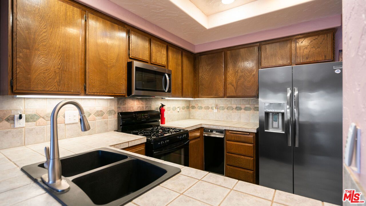 Interior, Kitchen, Recessed Lighting, Tile Countertops