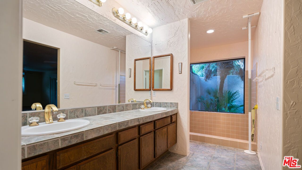 Bathroom, Dual Sink Vanities, Interior, Recessed Lighting, Tile Countertops