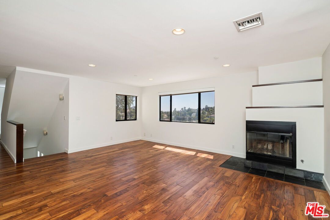 Empty room, Fireplace, Interior, Recessed Lighting, Wood Texture Flooring