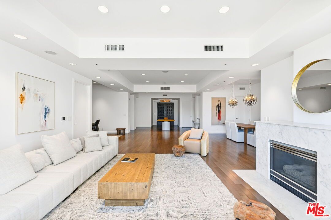 Dining room, Fireplace, Interior, Living room, Pendant Lights, Recessed Lighting, Wood Texture Flooring