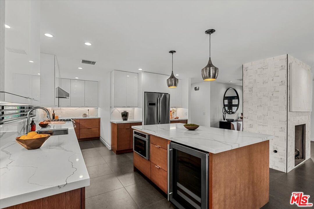 Fireplace, Interior, Kitchen, Pendant Lights, Recessed Lighting, Stainless Steel Appliances