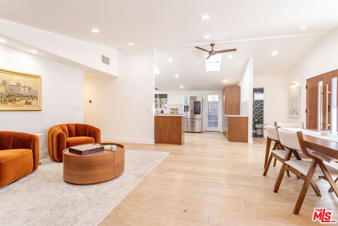 Dining room, Interior, Kitchen, Living room, Recessed Lighting, Stainless Steel Appliances, Wood Texture Flooring