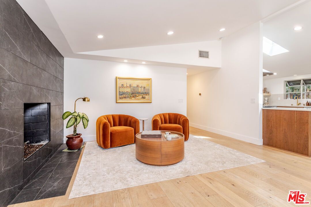 Fireplace, Interior, Living room, Recessed Lighting, Wood Texture Flooring