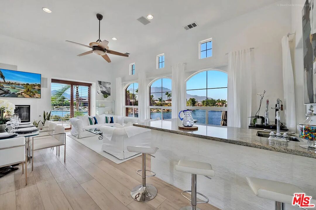 Fireplace, Interior, Living room, Recessed Lighting, Water, Wood Texture Flooring