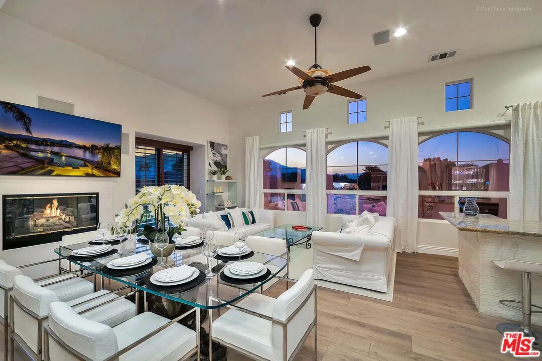 Dining room, Fireplace, Interior, Living room, Recessed Lighting, Wood Texture Flooring