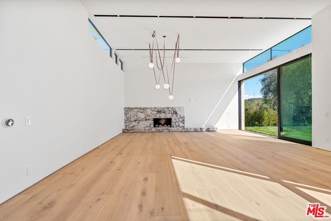 Empty room, Fireplace, Interior, Pendant Lights, Wood Texture Flooring