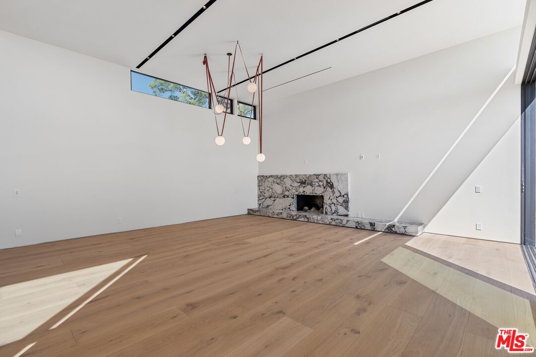 Empty room, Fireplace, Interior, Pendant Lights, Wood Texture Flooring