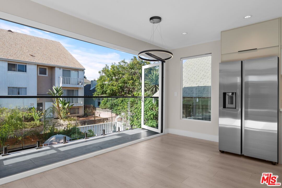 Elevator, Interior, Pendant Lights, Recessed Lighting, Stainless Steel Appliances, Wood Texture Flooring