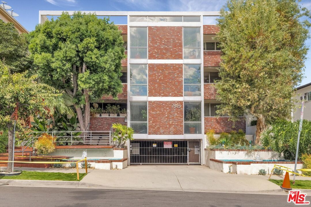 Exterior, Facade, Brick Facade, Condo Building