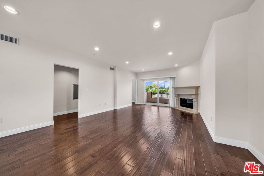 Empty room, Fireplace, Interior, Recessed Lighting, Wood Texture Flooring