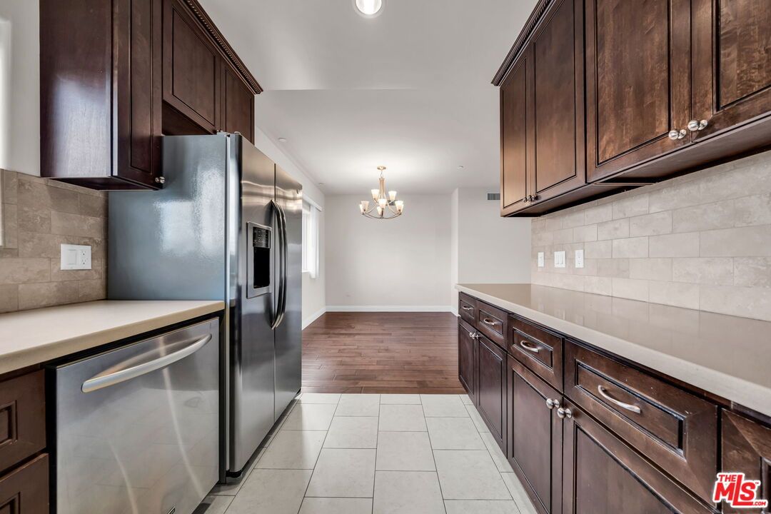 Chandelier, Interior, Kitchen, Recessed Lighting, Stainless Steel Appliances, Wood Texture Flooring