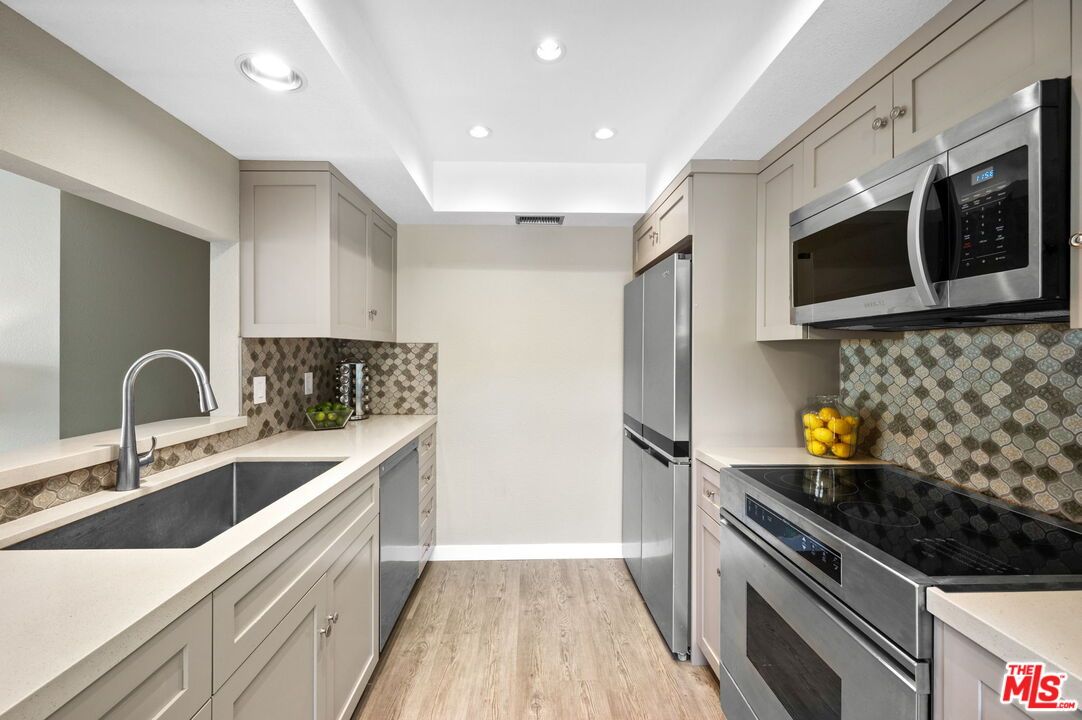 Interior, Kitchen, Recessed Lighting, Stainless Steel Appliances, Wood Texture Flooring