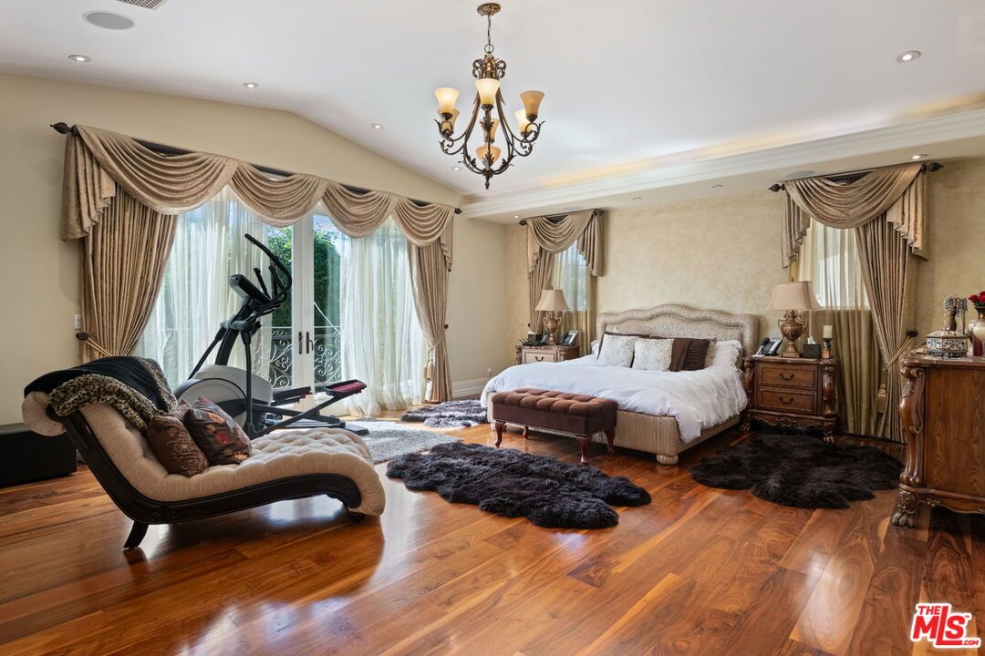 Bedroom, Chandelier, Fitness Equipment, Interior, Recessed Lighting, Wood Texture Flooring