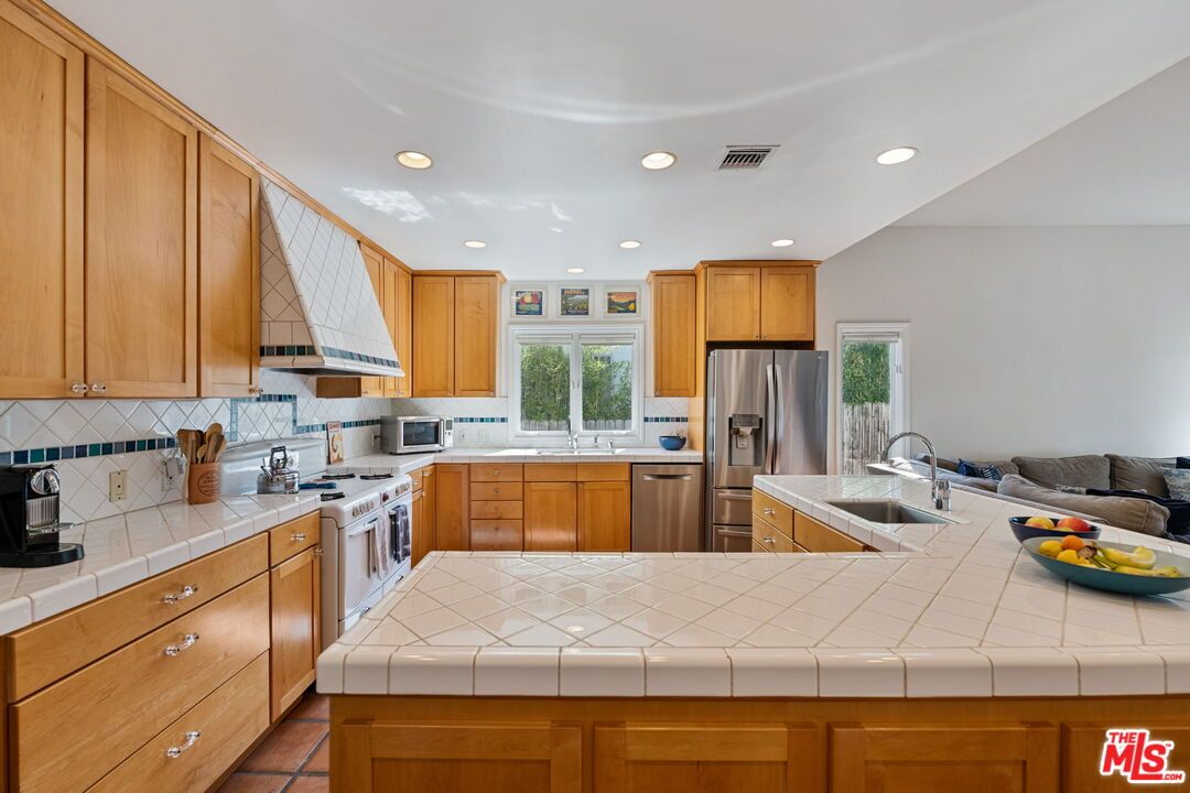 Interior, Kitchen, Recessed Lighting, Stainless Steel Appliances, Tile Countertops