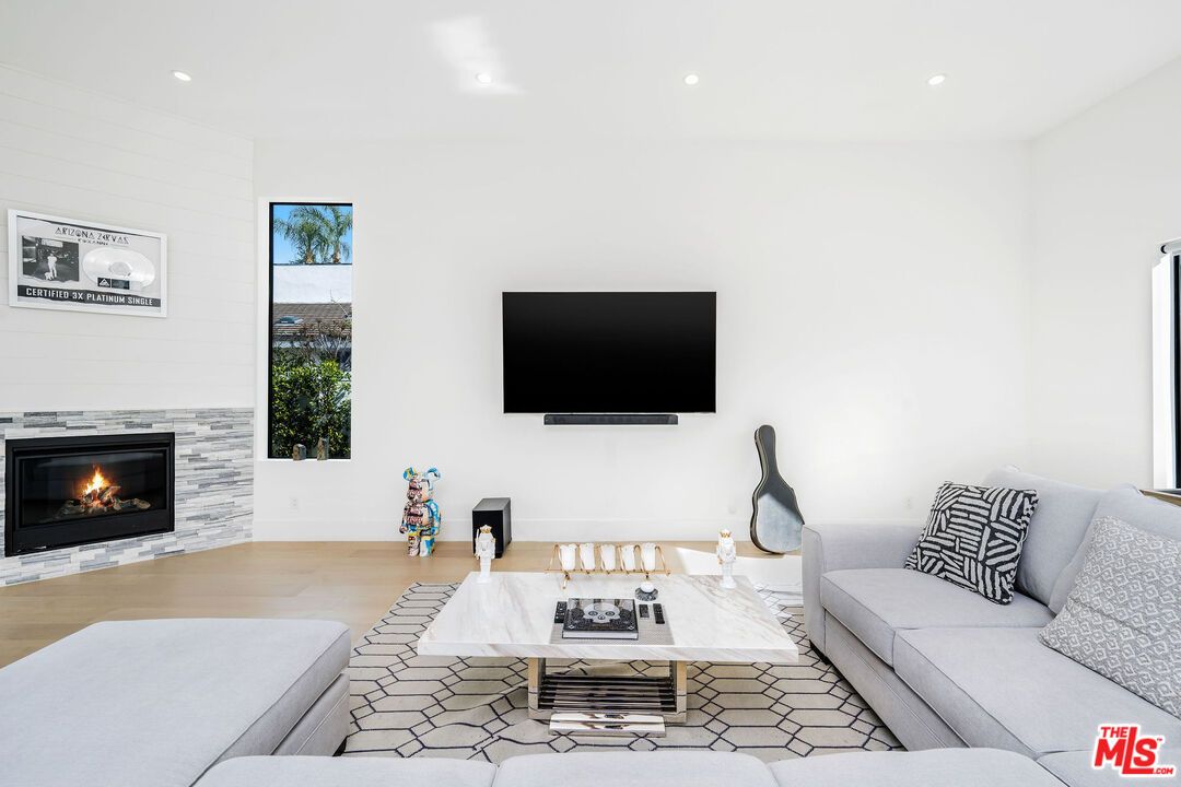 Fireplace, Interior, Living room, Recessed Lighting, Wood Texture Flooring