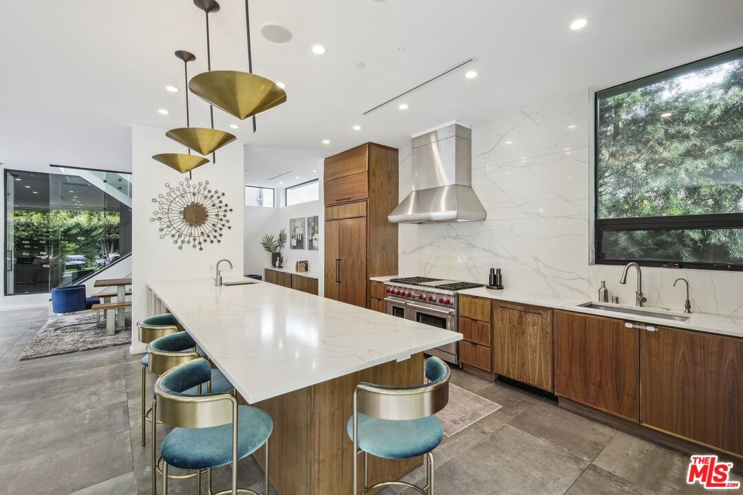 Interior, Kitchen, Marble Walls, Pendant Lights, Recessed Lighting, Stainless Steel Appliances