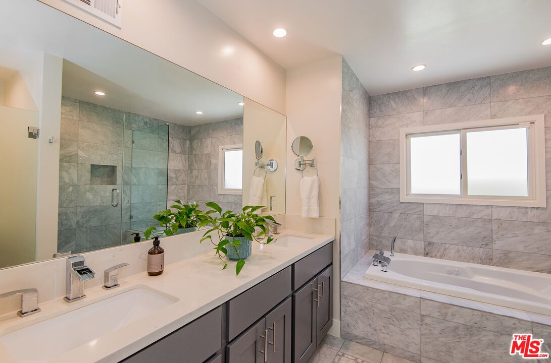 Bathroom, Dual Sink Vanities, Glass Shower, Interior, Marble Walls, Recessed Lighting