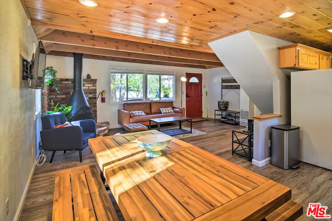 Dining room, Fireplace, Interior, Living room, Recessed Lighting, Wooden Beams, Wooden Ceilings, Wood Texture Flooring