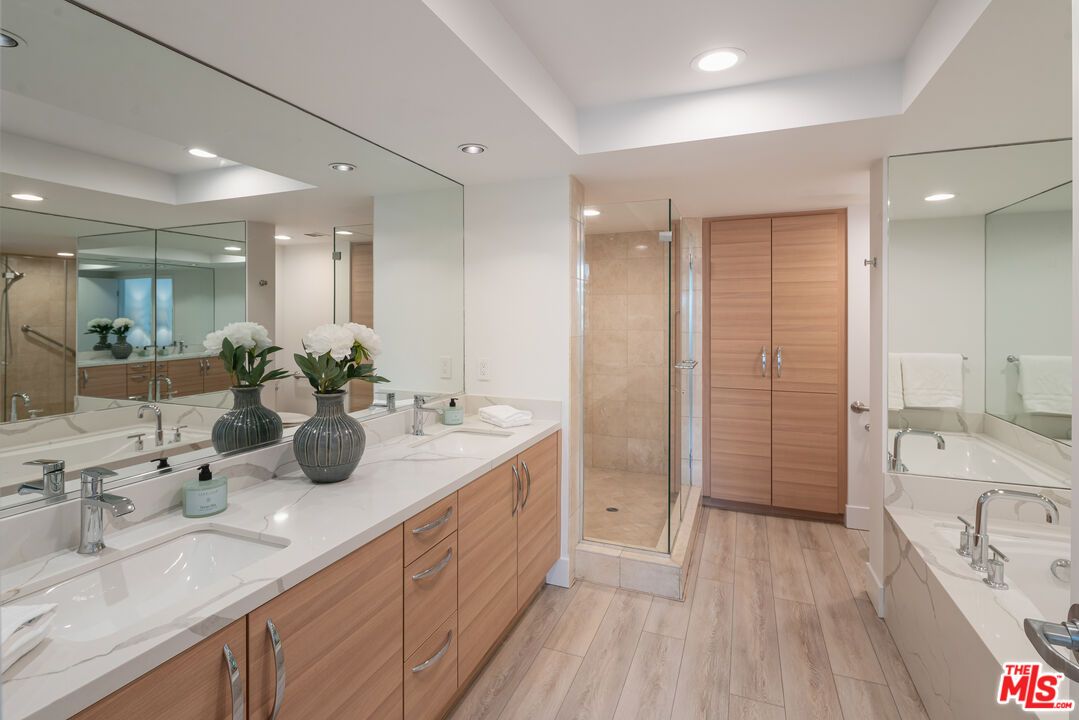 Bathroom, Dual Sink Vanities, Glass Shower, Interior, Recessed Lighting, Wood Texture Flooring