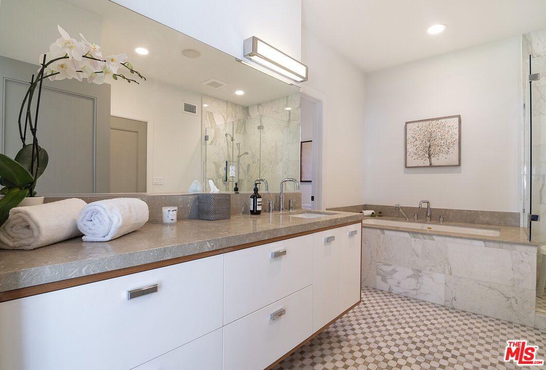 Bathroom, Dual Sink Vanities, Glass Shower, Interior, Marble Walls, Recessed Lighting