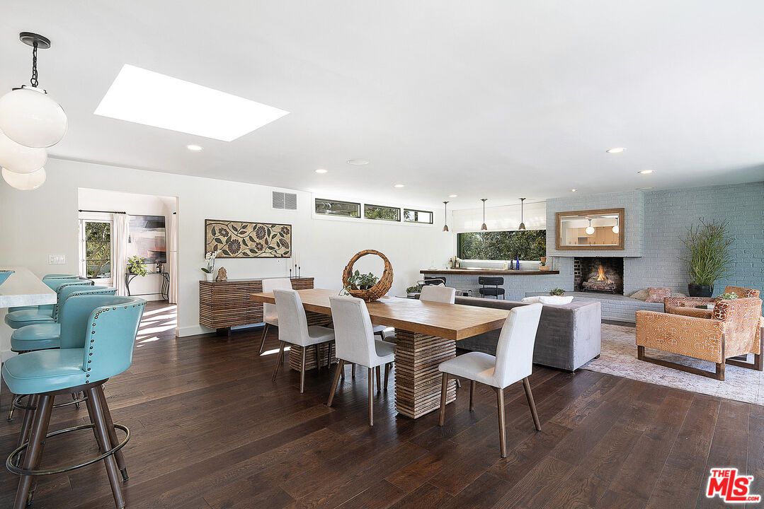 Dining room, Fireplace, Interior, Living room, Pendant Lights, Recessed Lighting, Wood Texture Flooring