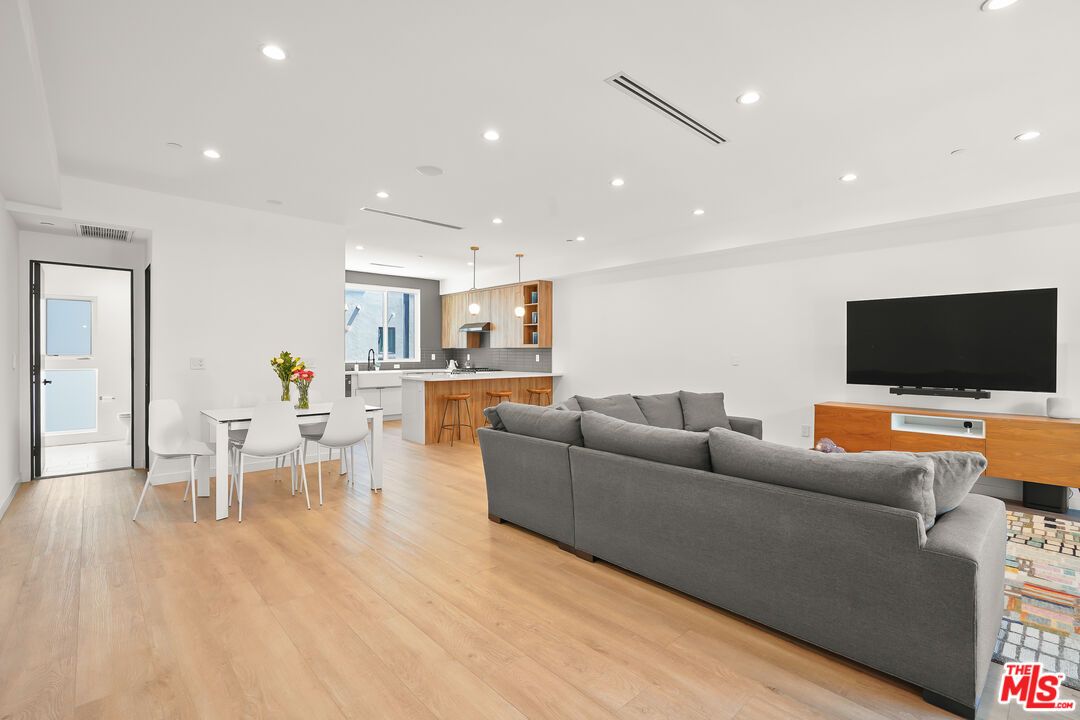 Dining room, Interior, Kitchen, Living room, Pendant Lights, Recessed Lighting, Wood Texture Flooring