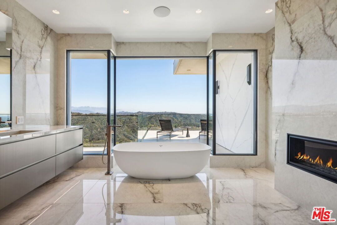 Bathroom, Fireplace, Free Standing Baths, Interior, Marble, Marble Walls, Recessed Lighting