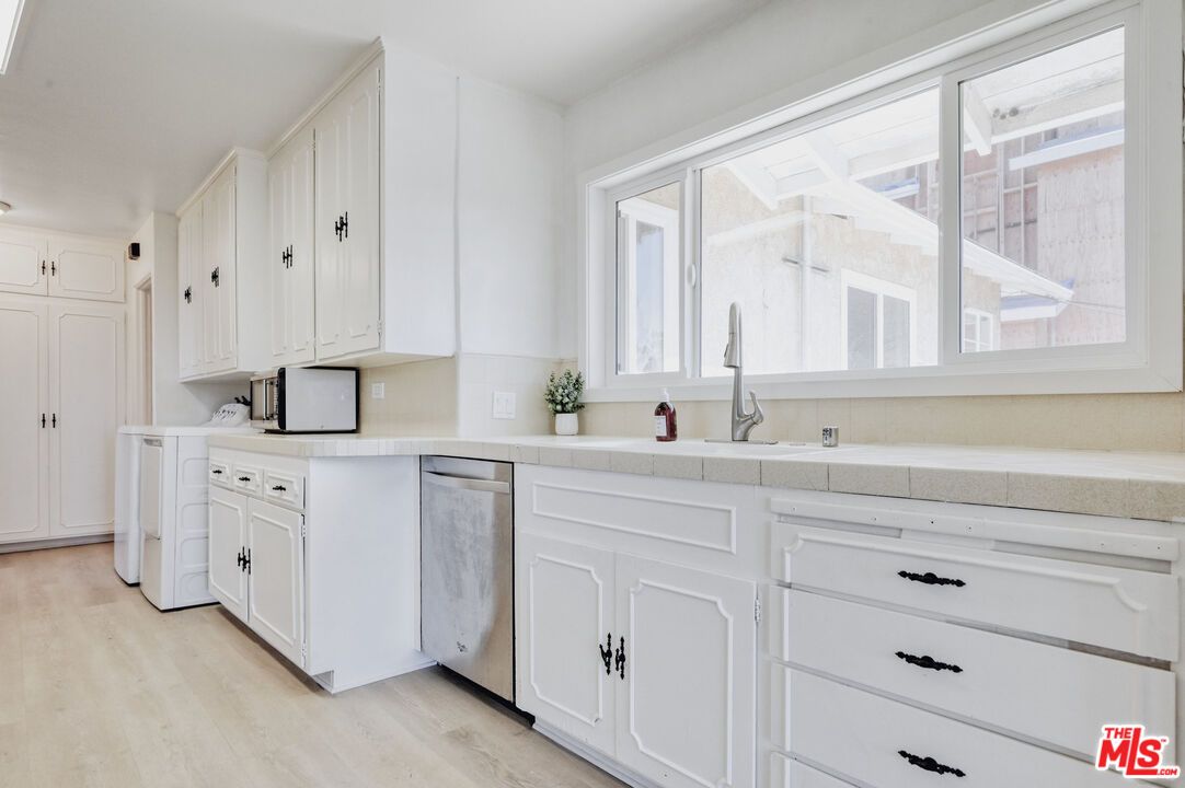 Interior, Kitchen, Tile Countertops, Wood Texture Flooring