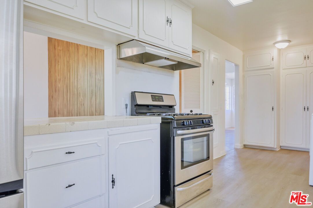Interior, Kitchen, Tile Countertops, Wood Texture Flooring