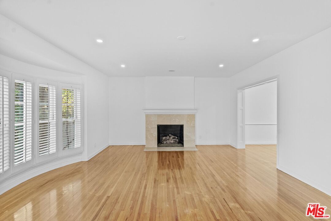 Empty room, Fireplace, Interior, Recessed Lighting, Wood Texture Flooring