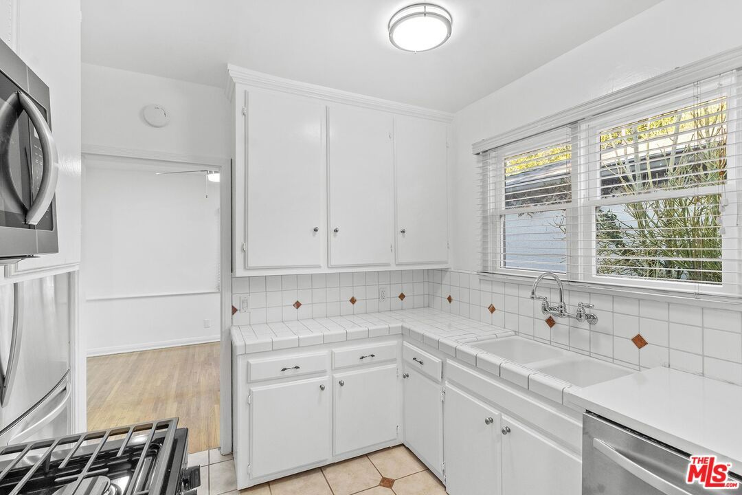 Interior, Kitchen, Tile Countertops, Wood Texture Flooring