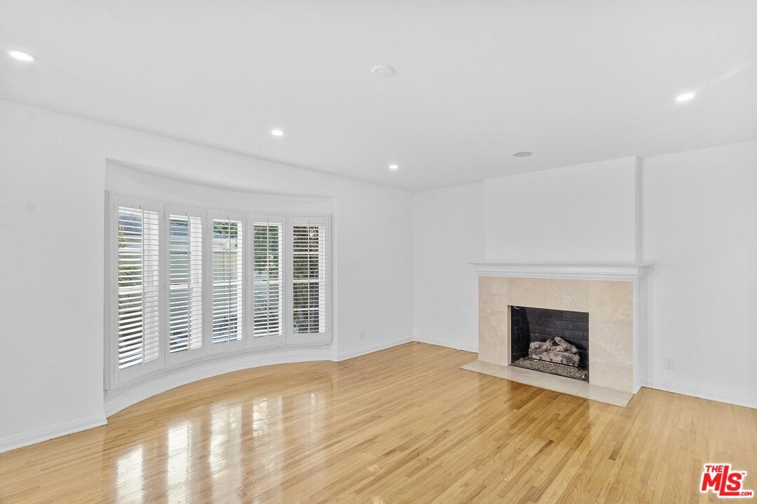 Empty room, Fireplace, Interior, Recessed Lighting, Wood Texture Flooring