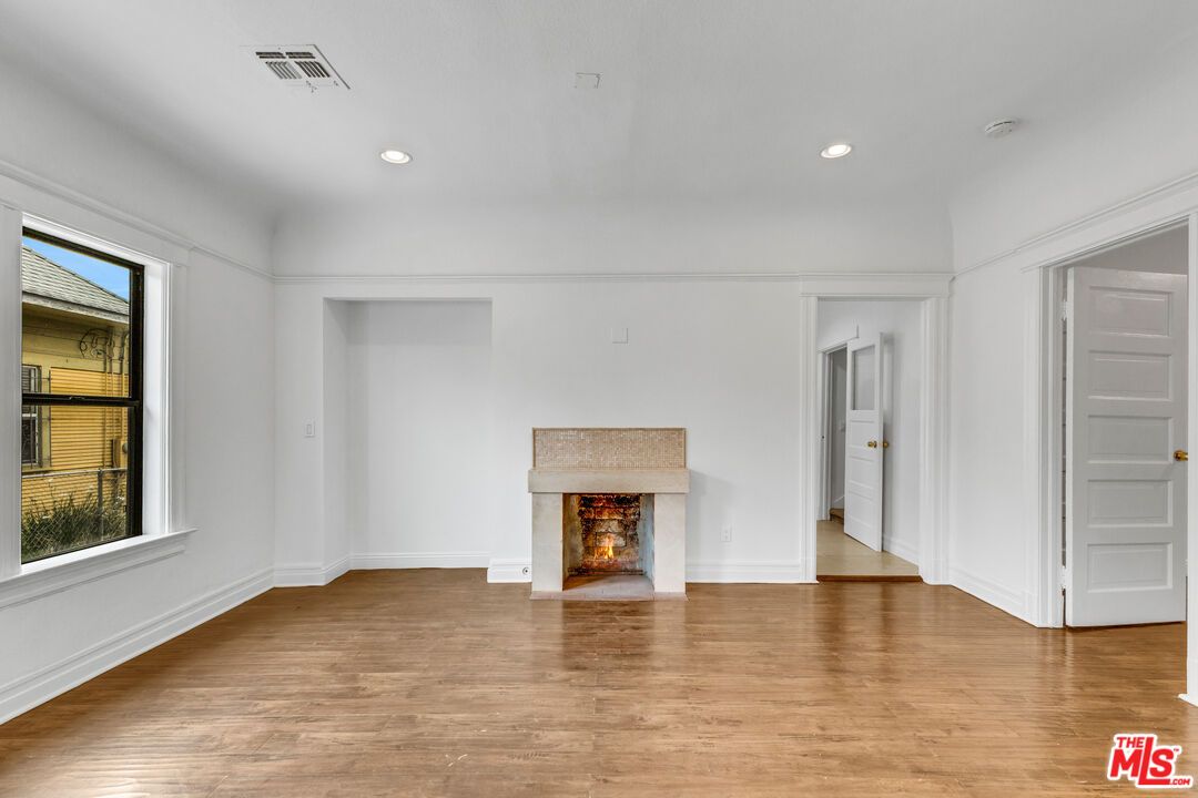 Empty room, Fireplace, Interior, Recessed Lighting, Wood Texture Flooring