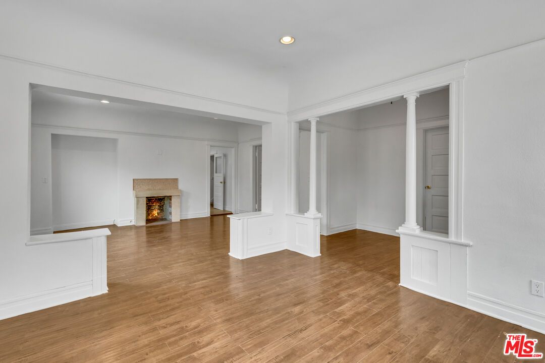 Empty room, Fireplace, Interior, Recessed Lighting, Wood Texture Flooring